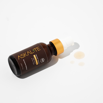 Askalite PIGMENTX™ Dark Spot Correcting Night Serum profoundly restores skin's luminosity. Askalite Formula pharmacist developed formulas for melanated skin, skin of color, people of color to fight discolorations, dark spot and uneven skin tone made with Teff peptides. Glowing skin products for black skin, Black skincare products, Natural black skin care products, Black female entrepreneurs 